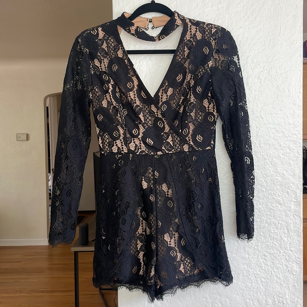 Francesca’s black and nude lace romper, worn once